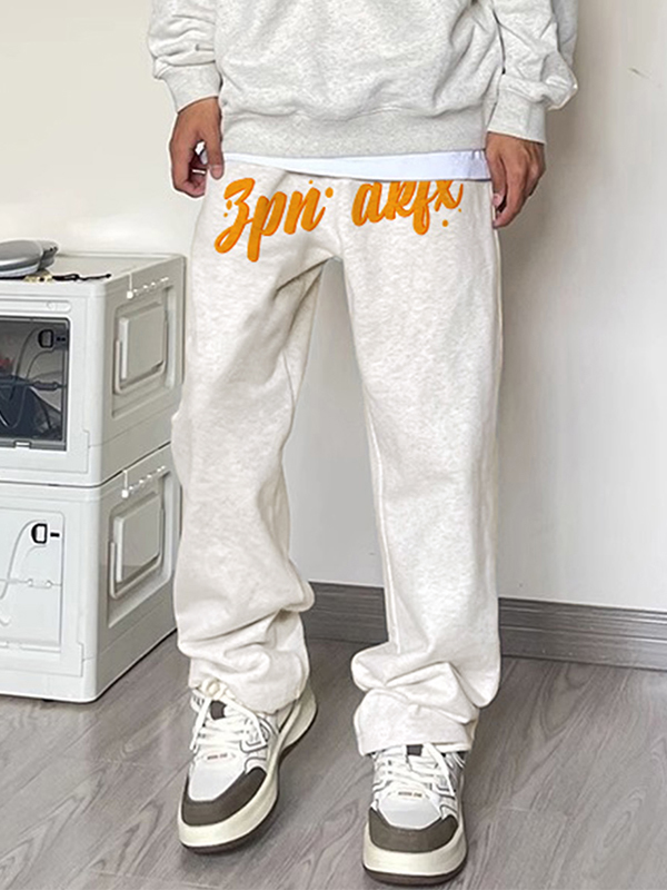 Pantalones de pierna ancha con pies atados y fruncidos lisos para hombre