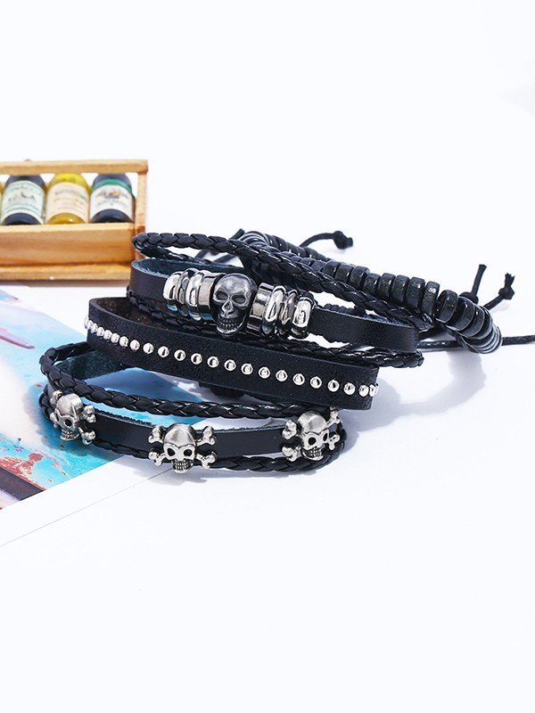 Juego de pulseras de cuero Pu con calavera de 4 piezas